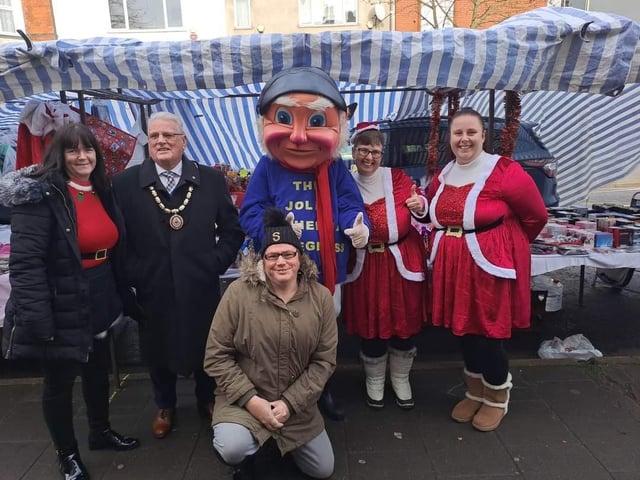 Mayor of Skegness Coun Tony Tye, Carnival Royalty and the Jolly Fisherman at Skegness Christmas market.