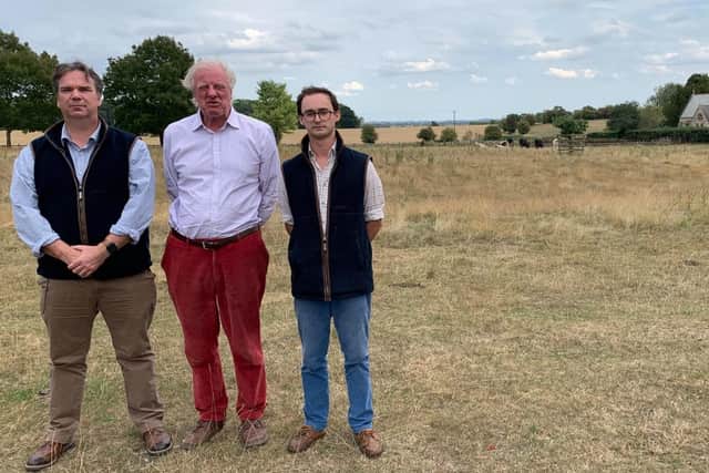 Coun Richard Butroid, Sir Edward Leigh and Henry Morris at one of the proposed solar farm sites