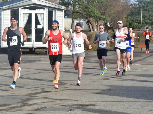 Skegness 10k competitors enjoying a race by the sea.
