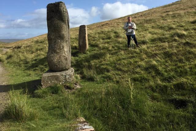 Hazel is pictured at the source of the South Tyne in Cumbria, alongside the sculpture by Gilbert Ward that marks the spot