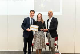 (L-R) Laura Trope and Tushar Majithia being presented with the Optometry Team of the Year Award.