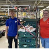 Tesco staff member Kai and Sally from Market Rasen Preschool Nursery