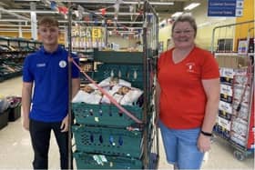 Tesco staff member Kai and Sally from Market Rasen Preschool Nursery