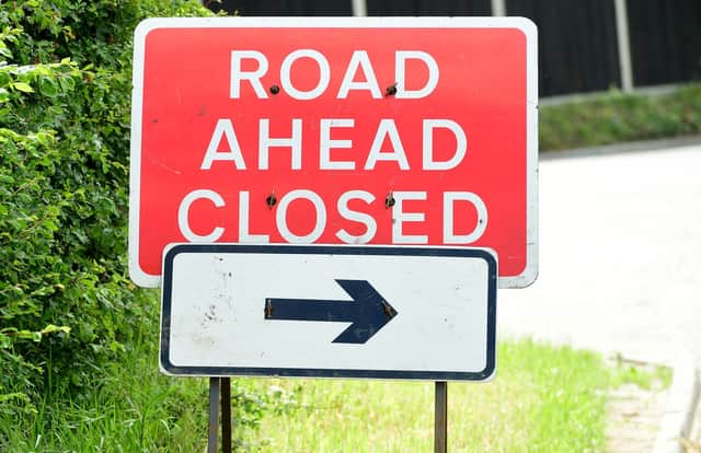 General view of a road ahead closed sign, London.