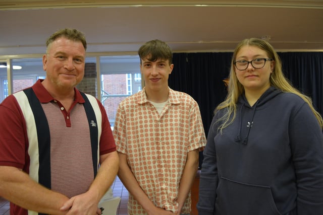 De Aston head teacher Simon Porter with Ellis Norris, who achieved 10 passes, including a grade 9 at Maths, and will be staying at De Aston for A-levels in Maths, Biology and Criminology; and Emily Marriott, who also achieved 10 good pass grades and will be staying on to study A-levels in English Literature, Law and Criminology.