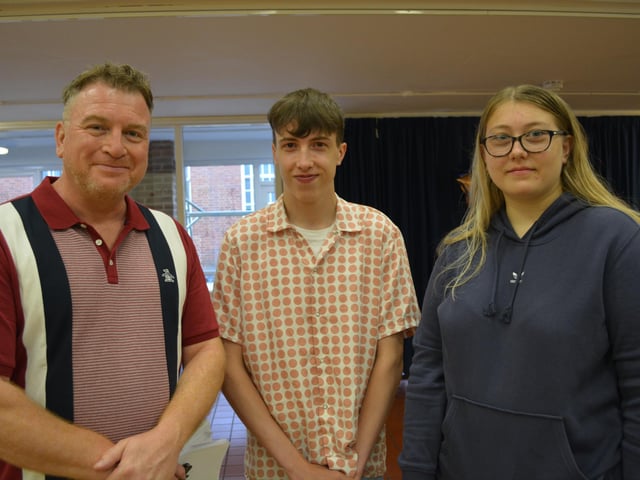 De Aston head teacher Simon Porter with Ellis Norris, who achieved 10 passes, including a grade 9 at Maths, and will be staying at De Aston for A-levels in Maths, Biology and Criminology; and Emily Marriott, who also achieved 10 good pass grades and will be staying on to study A-levels in English Literature, Law and Criminology.