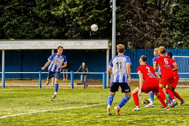 Jordan Tate heads home against Heanor to make it 2-2 – photo (c) Steve Davies