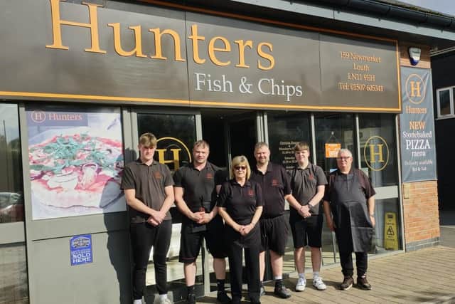 Manager Sandra Jaines with the rest of her staff outside Hunters fish and chip shop at Newmarket in Louth, which is celebrating its tenth anniversary.