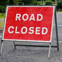 The A153 near Ancaster closed after a two-car collision.