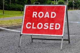 The A153 near Ancaster closed after a two-car collision.