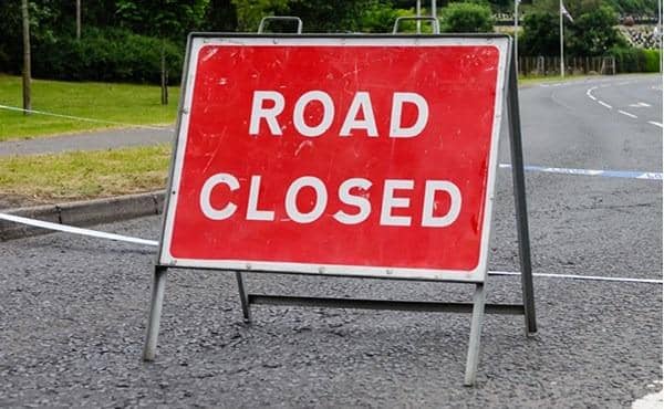 The A153 near Ancaster closed after a two-car collision.