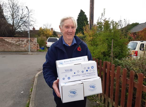 Rotary Shoebox co-ordinator Barry Chambers with some of the boxes donated