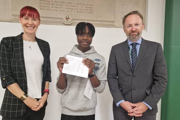 Harold Akomolafe celebrating his results with Headteacher Jude Hunton and Head of School Mrs Lorraine Walker.