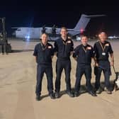 Darren Burchnall, Ben Clarke, Karl Keuneke and Neil Woodmansey with Colin the rescue dog.