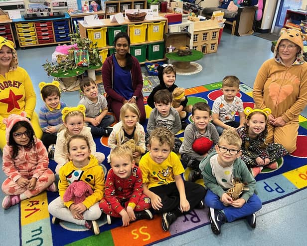 Enchanted Forest Class (Reception) with Miss Cook (left) Mrs Jena (centre) and Mrs Elmes (right) dressed up for Children In Need at Caythorpe School.