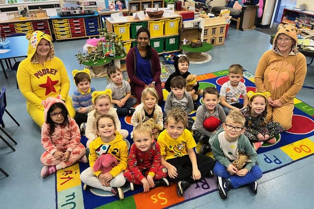 Enchanted Forest Class (Reception) with Miss Cook (left) Mrs Jena (centre) and Mrs Elmes (right) dressed up for Children In Need at Caythorpe School.