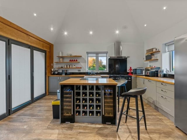 The kitchen in the outbuilding that forms part of the outside entertaining area.