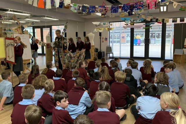 Sandie Stratford recreates the COP26 walk with school pupils.