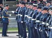 "Have we met before?"" Prince Charles shares a joke on the parade ground at RAF College Cranwell during the graduation parade.