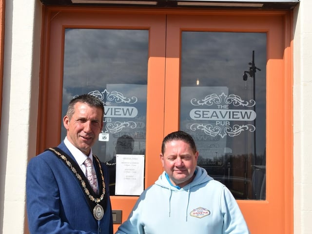 Mayor of Skegness Coun Adrian Findley congratulates Mark Dannatt, owner of the Seaview Pub in Skegness, on another successful egg run.