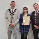 Summer Willets, 14, receives her Community Award from the new Mayor of Skegness Coun Adrian Findley and Deputy Mayor Coun Jimmy Brookes.