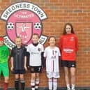 Skegness Town JFC ceering on the Lionesses with coaches from their AFC women's team.