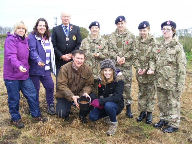 Hundreds of poppy seeds being sown at Mareham Pastures Nature Reserve, in Sleaford, to mark the 100th anniversary of the First World War’s outbreak. Pictured (from left, back) Kathy Blythe (secretary of the Friends of Mareham Pastures), Zoe Watson (chairman of the Friends), chairman of the Sleaford Branch of the Royal British Legion Maj Clive Candlin, Army cadets Annabel Ford, Nathan Godson, Emily Mae Honey and Sophie Henton, (front) Matthew Davey, of Lincolnshire County Council, and nature reserve volunteer Charlotte Orris.