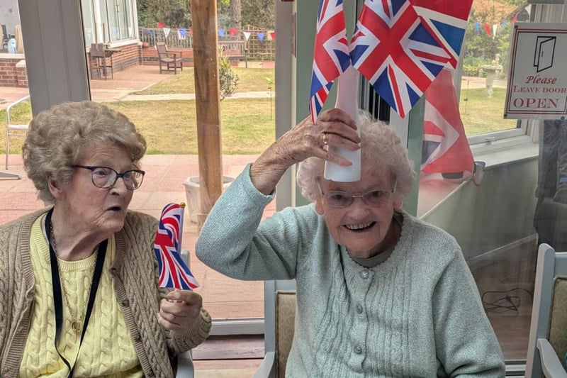 Flying the flag - Joy Kirke and Ann Holmquest.