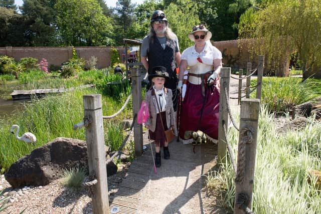 Steampunks Hazel and David Michael with Sapphire Michael, 6, of Lincoln.