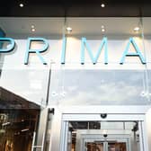 Primark owner Associated British Foods has upped its outlook for the full year after reporting a jump in sales at the budget fashion chain