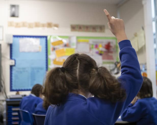 File photo dated 27/11/19 of school children during a class at a primary school, as teaching assistants are taking second jobs or leaving education to work in better-paid roles amid cost-of-living pressures, a report by The National Foundation for Educational Research suggests.