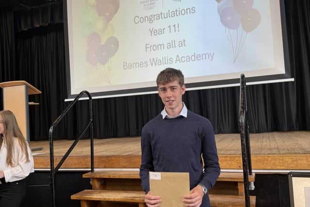 George Baker collecting his results.