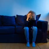 PICTURE POSED BY MODEL A woman showing signs of depression.