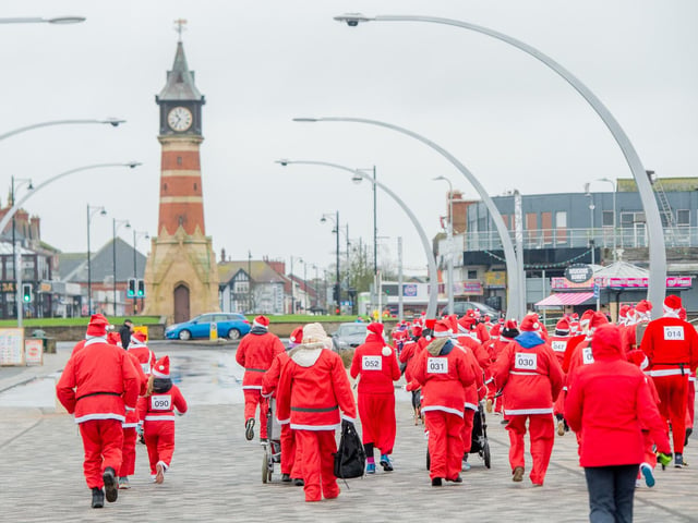 Santas set off on an annual fun run in Skegness.