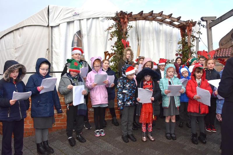 Wragby Primary School children entertained market-goers with carols