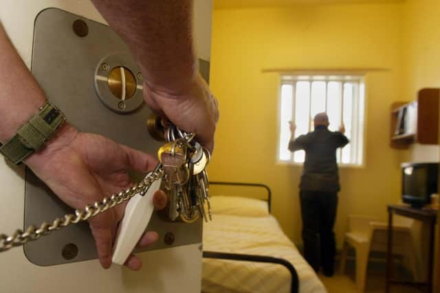 File photo dated 07/11/03 of a prison cell, as private firms are better at running prisons than the public sector and all jails should be subject to open competition, an independent think tank said today.