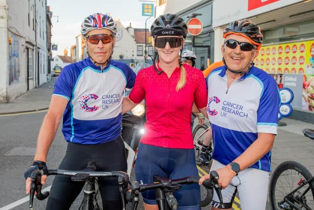Peter Goy, Lucy Bullas and Owen Koslow arrived back in Louth.Cancer Research Cyclists