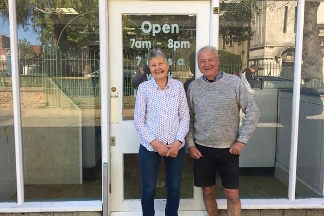 Joy and George outside the laundrette in Red Lion Street.