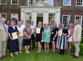 All the winners and those who were 'highly-commended' in the Pride of Boston Awards, with chairman of the Civic Group, Dudley Bryant, far left, and MP Matt Warman, far right.