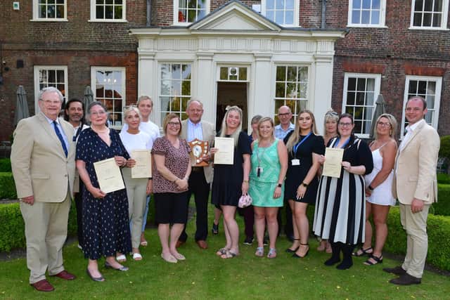 All the winners and those who were 'highly-commended' in the Pride of Boston Awards, with chairman of the Civic Group, Dudley Bryant, far left, and MP Matt Warman, far right.