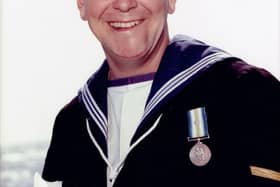 Mark Trainor, then aged 21, with his South Atlantic Medal.