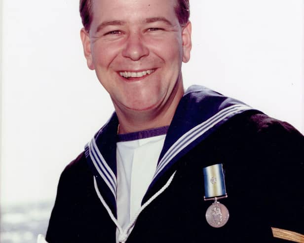 Mark Trainor, then aged 21, with his South Atlantic Medal.