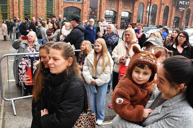 Crowds waiting for the new store to open