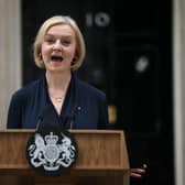 Britain’s Prime Minister Liz Truss delivers a speech outside of 10 Downing Street in central London on October 20, 2022 to announce her resignation. (Photo by Daniel LEAL / AFP) (Photo by DANIEL LEAL/AFP via Getty Images)