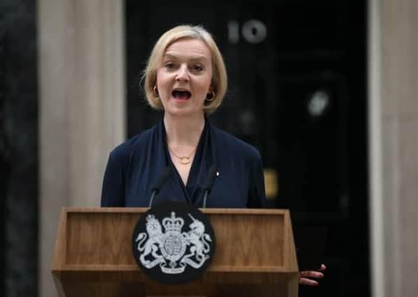 Britain’s Prime Minister Liz Truss delivers a speech outside of 10 Downing Street in central London on October 20, 2022 to announce her resignation. (Photo by Daniel LEAL / AFP) (Photo by DANIEL LEAL/AFP via Getty Images)