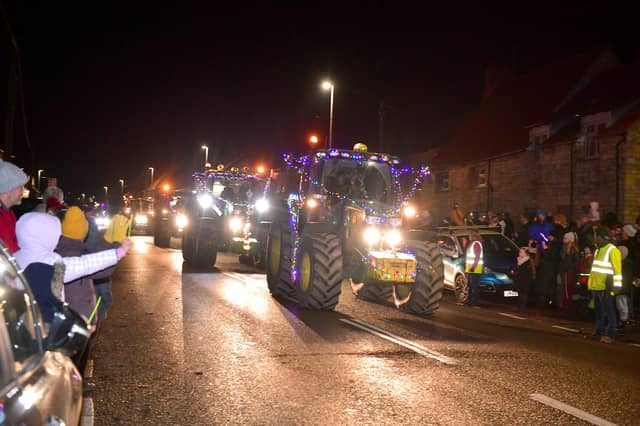 Harmston YFC members' cavalcade of tractors through Navenby's Christmas lights event. Photo: David Dawson