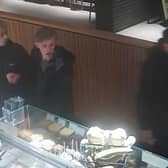 Police are looking to identify these men on camera in a Starbucks coffee shop as they believe they could help with their inquiries. Photo: Lincs Police