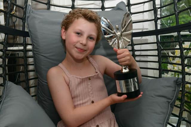 Freya with her Pride of Britain Award Child of Courage award.