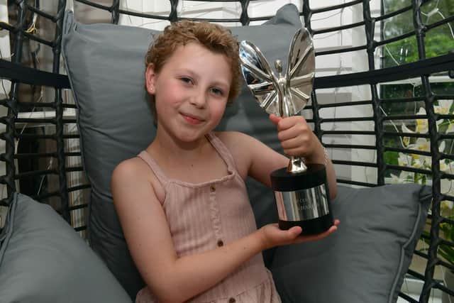 Freya with her Pride of Britain Award Child of Courage award.
