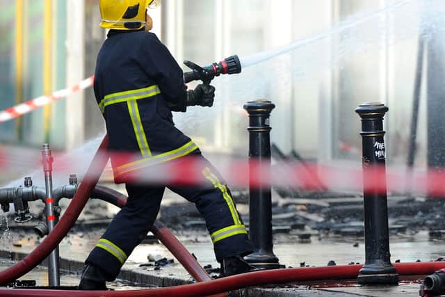 Undated file photo of a firefighters tackling a blaze. Thousands of firefighter jobs have been cut in the past decade, leaving the total at a new low, a report claims. The Fire Brigades Union (FBU) said one in five roles have been lost since the beginning of austerity in 2010 across the UK, reducing by 11,680. Issue date: Tuesday October 5, 2021.